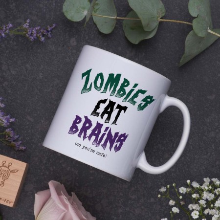 Zombies eat brains (so you're safe) Mug