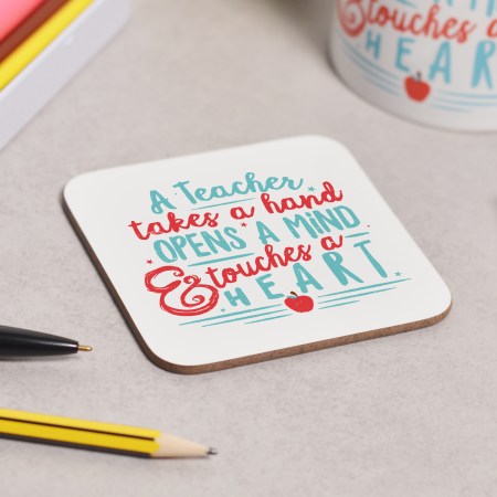 A teacher takes a childs hand Coaster